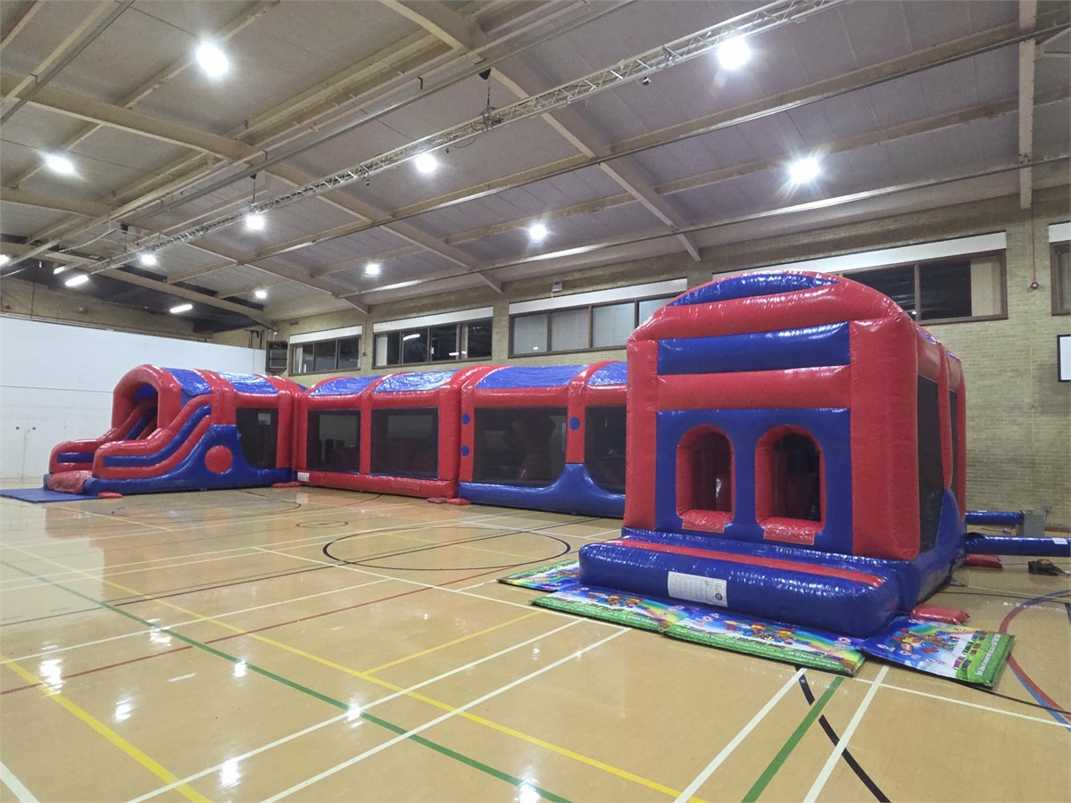 Red and Blue Assault Course - 100ft - Bouncy Castle Hire in North ...